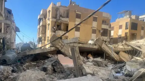Apartment building destroyed by a recent Israeli air strike in Sidon, southern Lebanon (5 March 2026)
