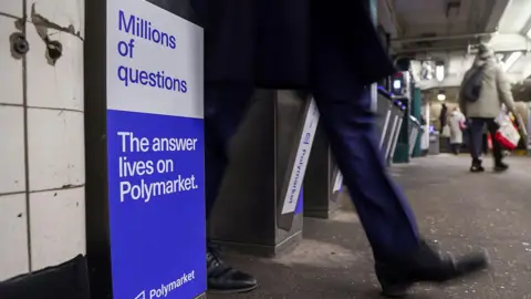 Bloomberg via Getty Images A Polymarket advertisement in a subway station in New York, US, on Thursday, Feb. 5, 2026.